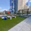 Skydeck USA Comfort Turf on Pedestals and SkyWalk SD-83C concrete pavers on skyjack pedestals at The Biltmore New York