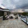 Quartzite Sandy Island 2cm Porcelain Pavers on roof deck by Skydeck USA