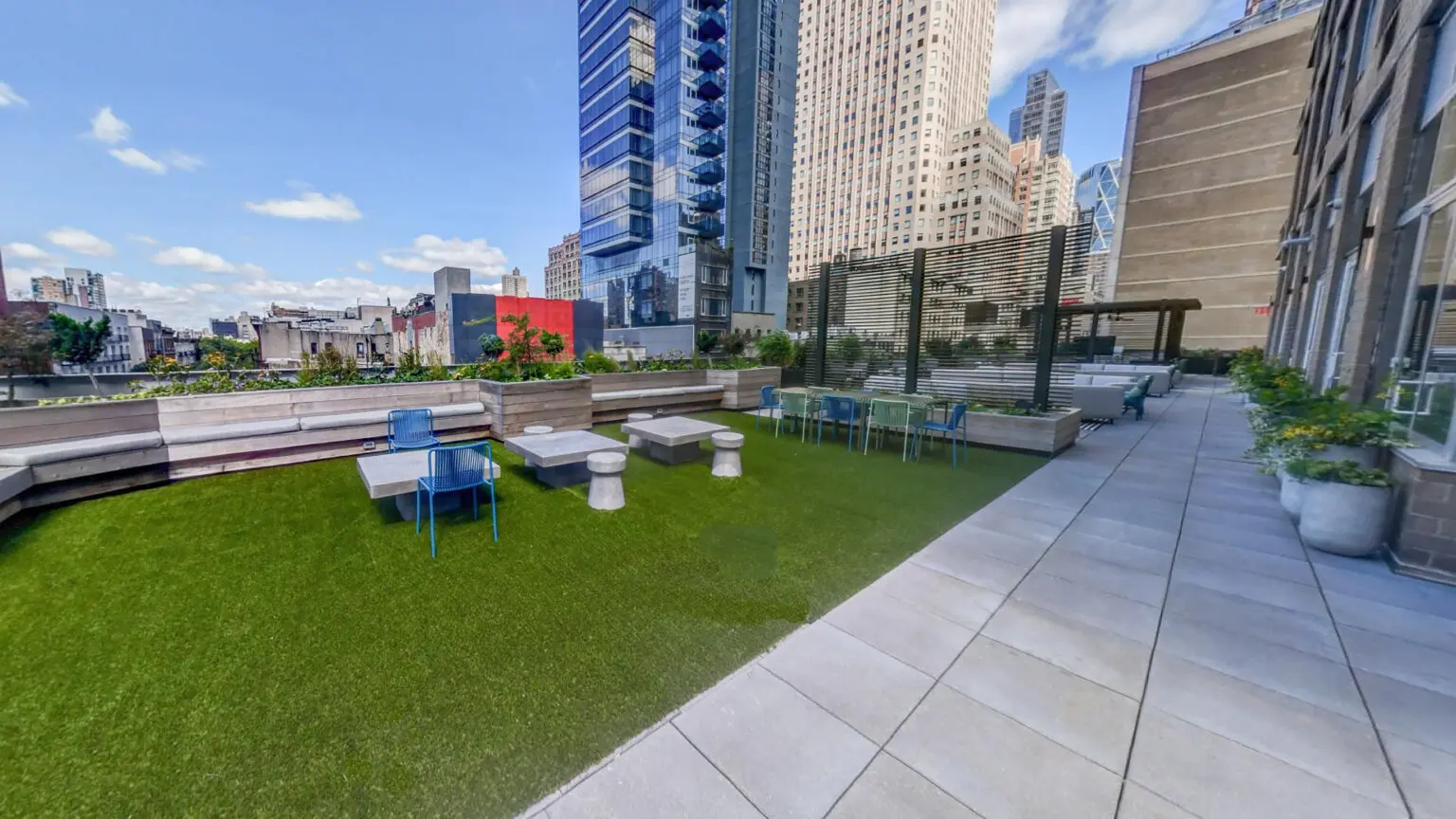 Skydeck USA Comfort Turf on Pedestals and SkyWalk SD-83C concrete pavers on skyjack pedestals at The Biltmore New York