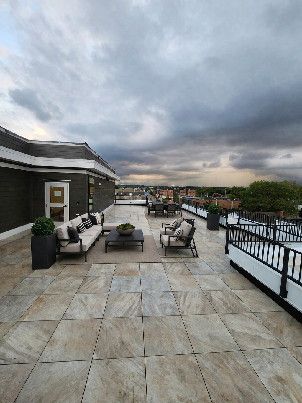 Quartzite Sandy Island 2cm Porcelain Pavers on roof deck by Skydeck USA